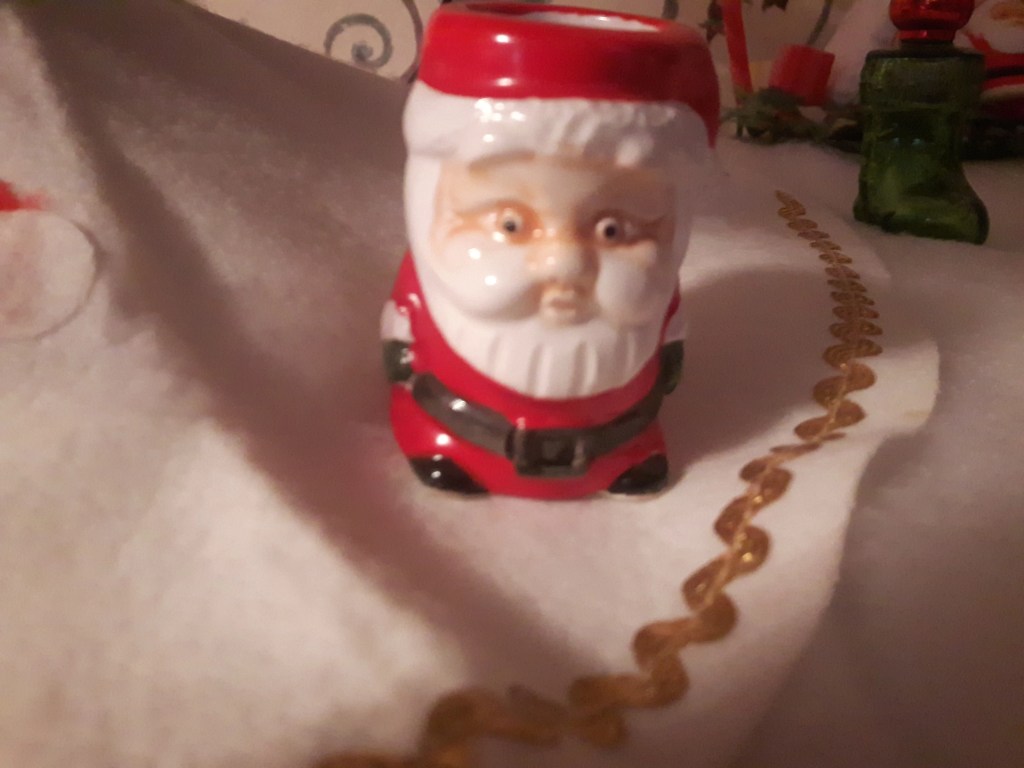 An image of a toothpick holder shaped like Santa.